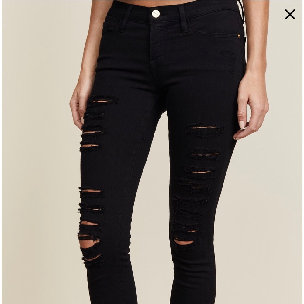 Frame black distressed skinny jeans